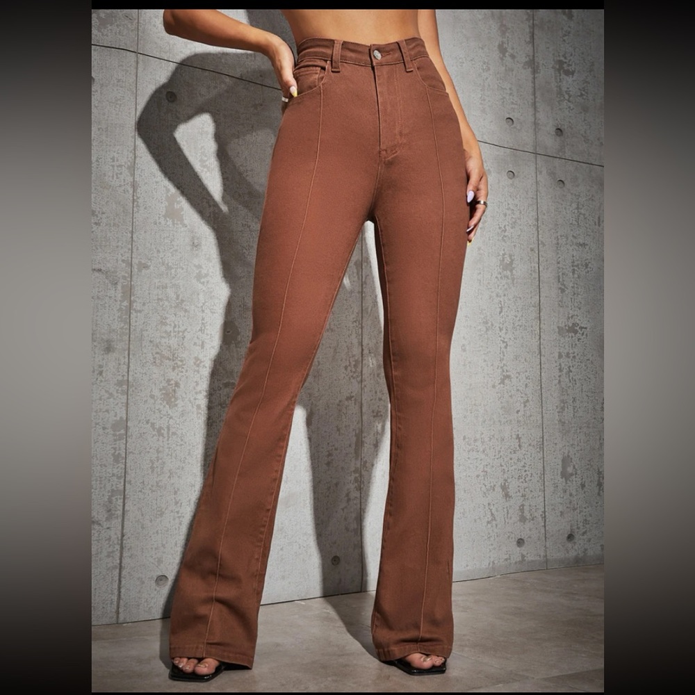 Brick red high waisted flare jeans.
